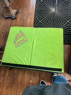 Mad rock bouldering or rock climbing crash pad