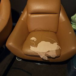Free- Orange swivel chair (rolls/rotates smoothly).