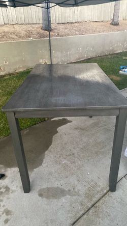 Ashley’s Gray rustic wood table