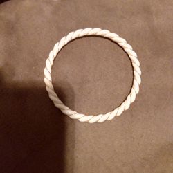 24 Karat Gold Wrapped In Between An Ivory Bracelet