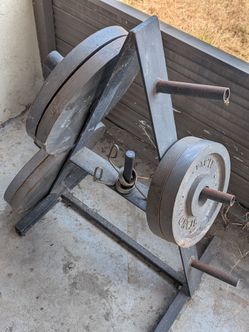 Olympic weight plates, 2x45lbs, 2x35lbs, 2x25lbs, rack and two collars