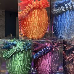 3-D feathered egg with dragon 24inches dragon