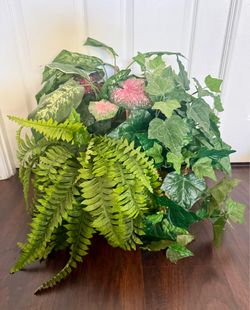 basket with artificial plant