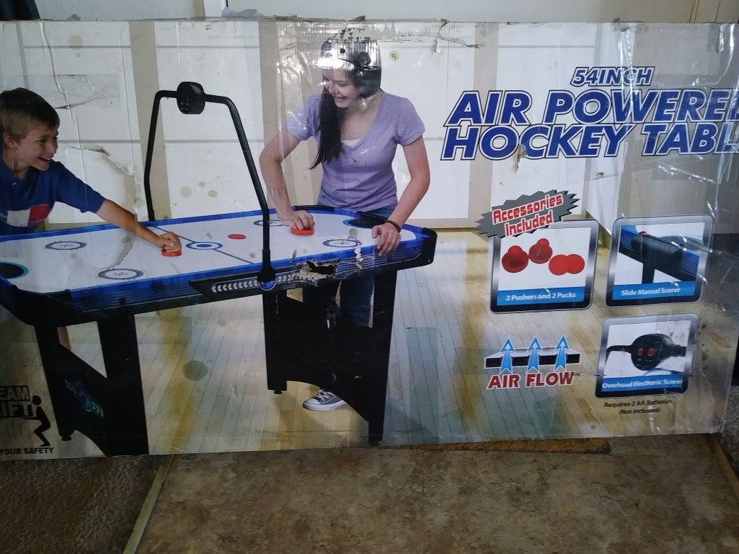 Air powered air hockey table