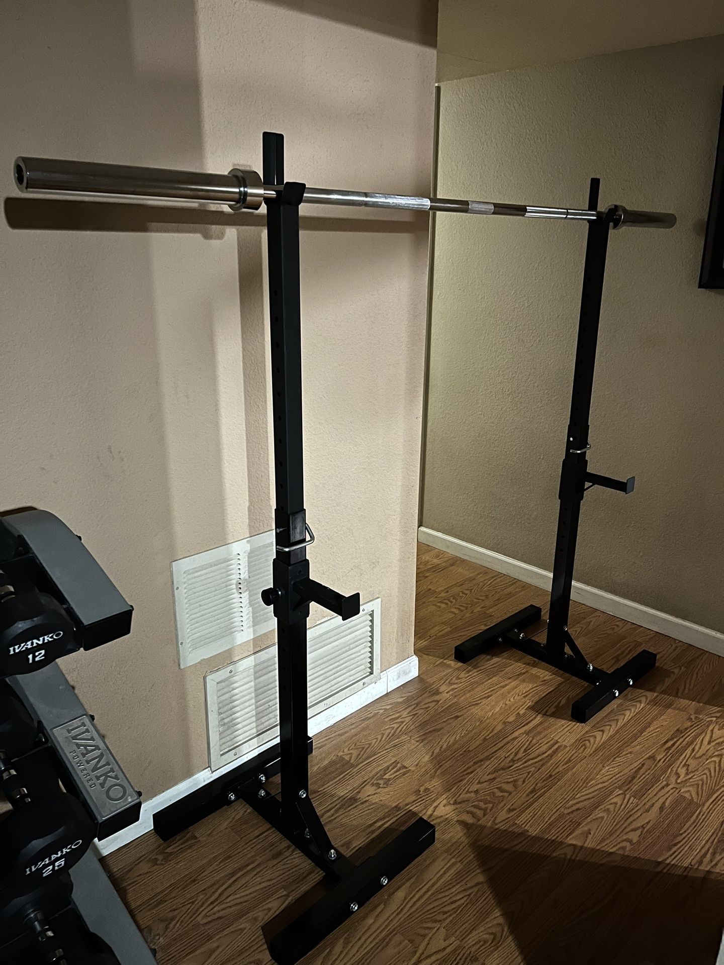 Adjustable Rack with 7 ft Barbell good condition