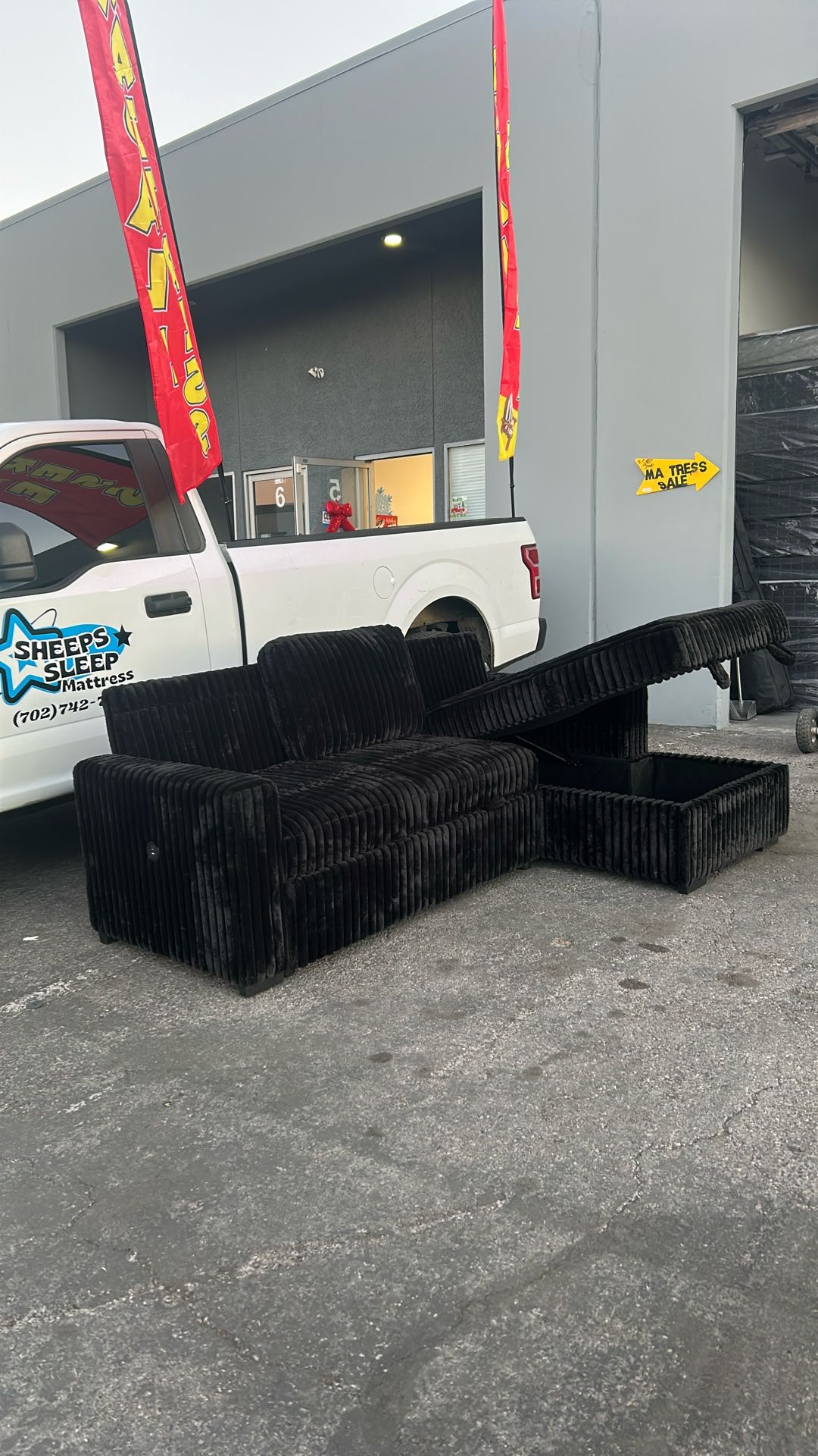 Sectional Black Sofa With Storage And Pullout Bed