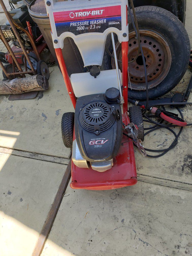 Two Pressure Washers And Garage Opener