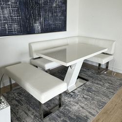 White Glossy Dining Table With Couch Like Seating