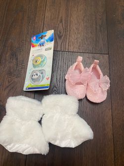 Girls lot of 2 shoes and boots pacifiers