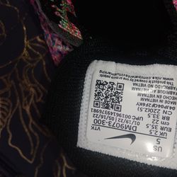 This is a pair of Nike Air Max Flyknit Racer sneakers in the Ghost Green/Pink Blast