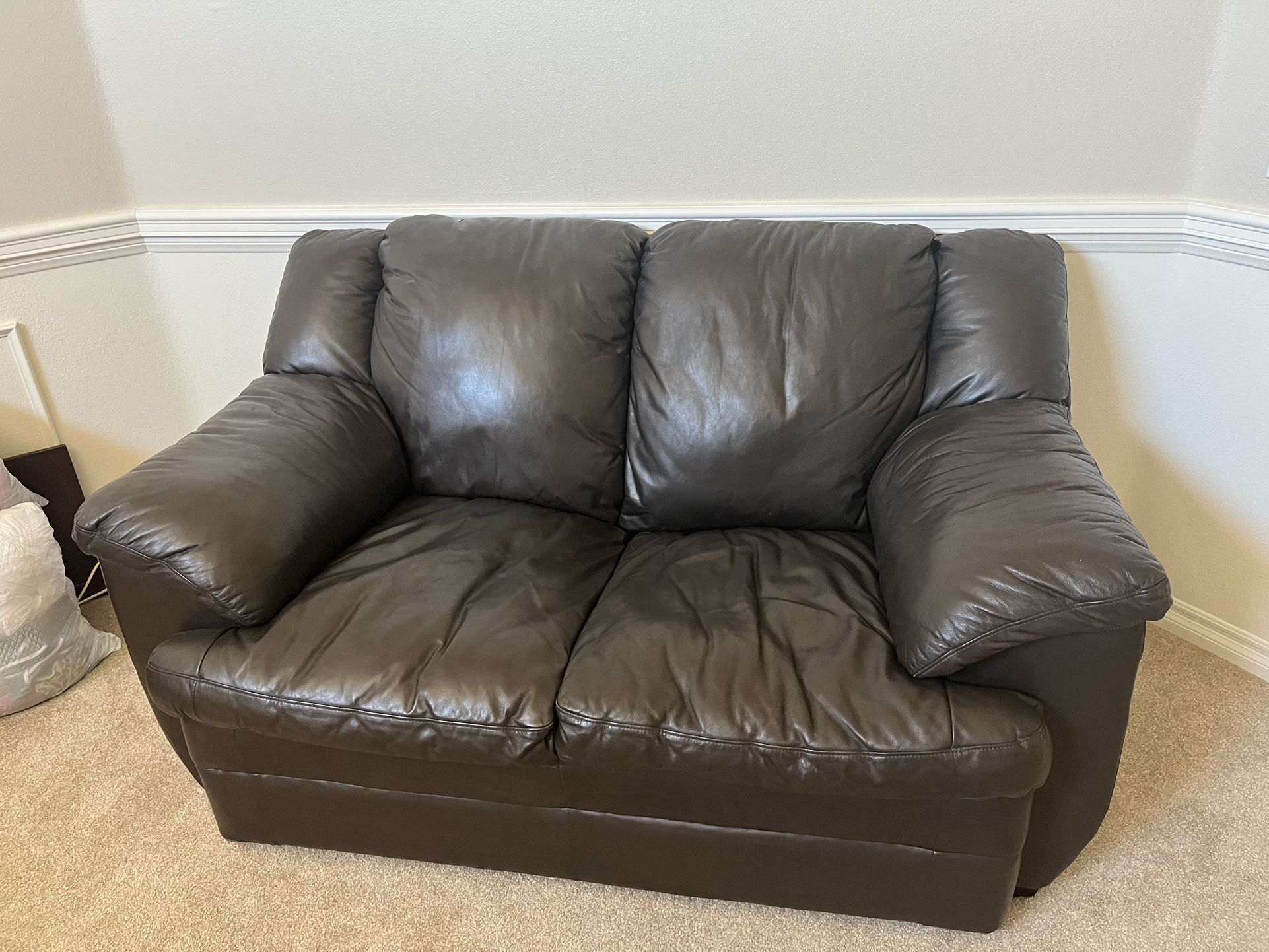 Free: Leather Sofa + Love Seat