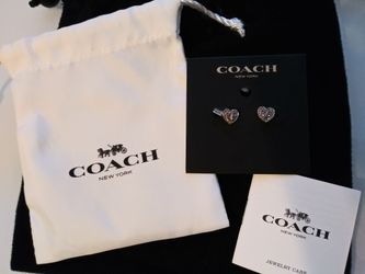 COACH earrings. Brand new w/tags. Silver with little diamonds around it. Great Valentine's gift!!