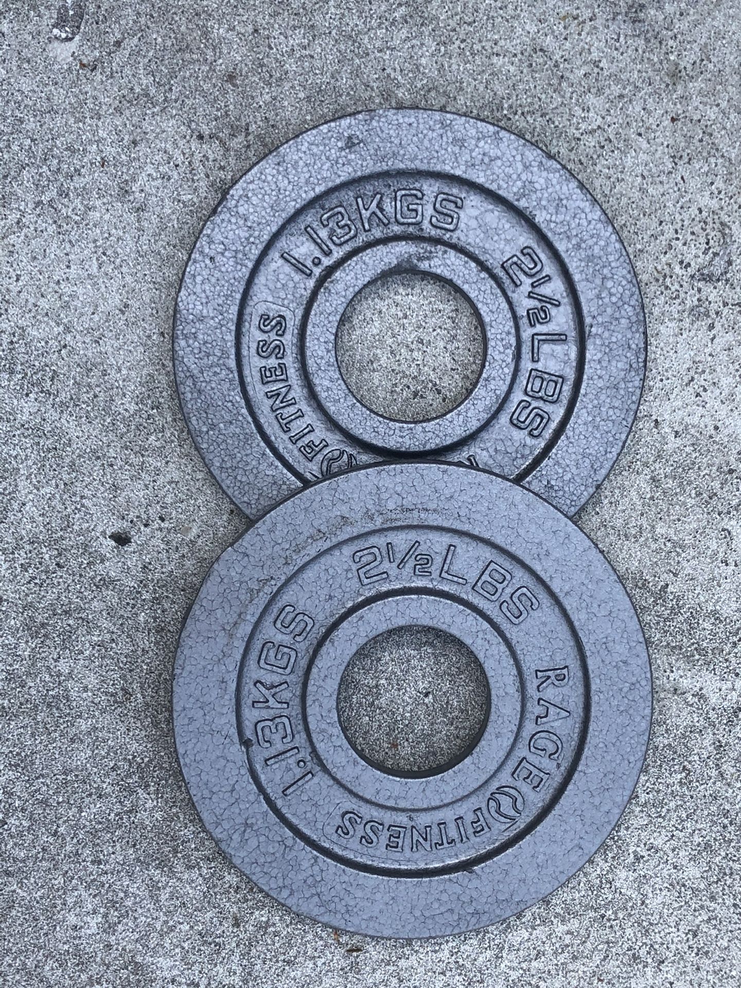 Multiple pairs of 2.5 Olympic weight plates