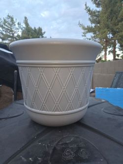 Gray Plastic Planter Pot hose holder