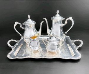Brand new, not opend silver plate tea set, in the original box from Montgomery Wards in 1965