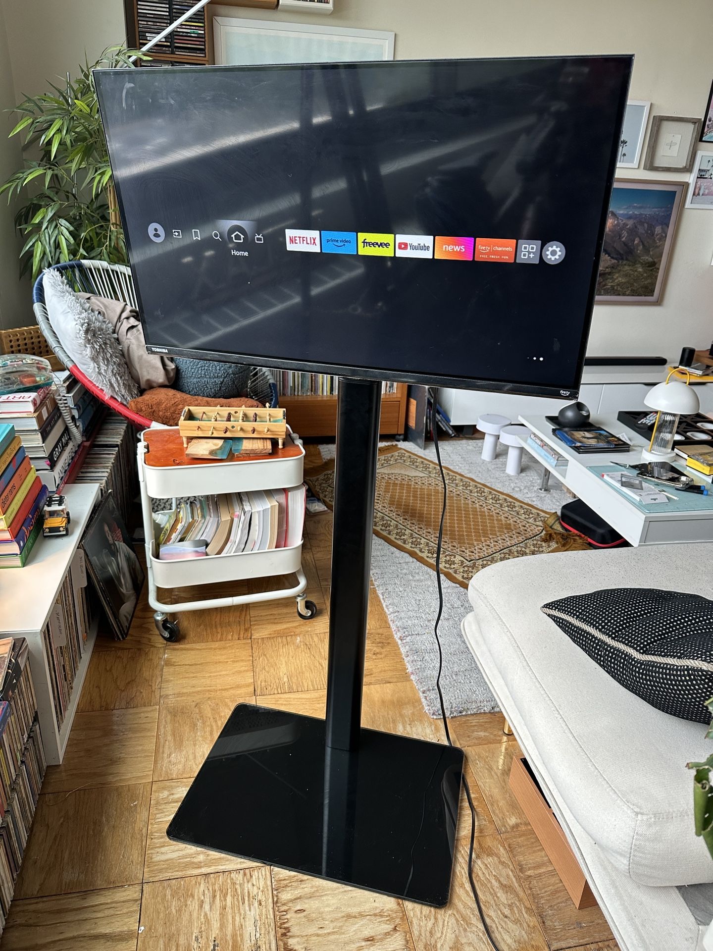 Smart TV and stand. Great for displaying info