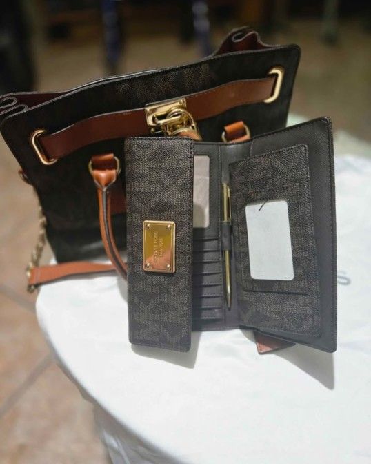 Michael Kors purse and wallet with pen