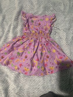 Disney store Purple Rapunzel Print Smocked Sundress size 3t
