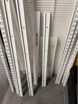 Container Store ELFA shelf and drawer system
