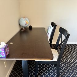 Like new  Large Autonomous Height Adjustable Desk And Two Chairs 