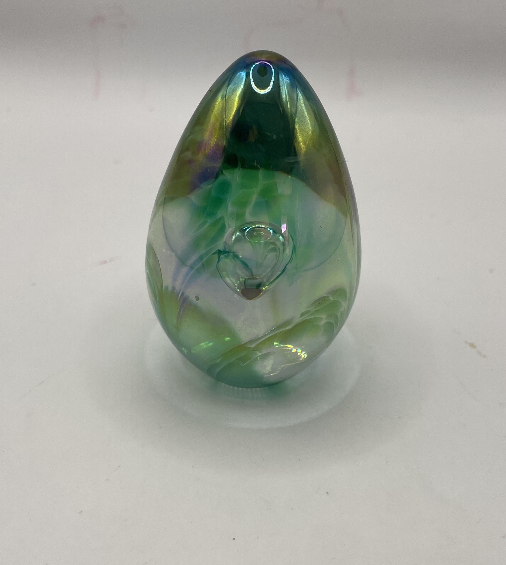 Dichroic glass egg-shaped paperweight green hues & iridescent
