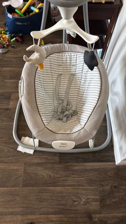 Electric baby swing