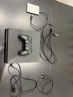 PS4 Slim + Controller + 1TB External Hard Drive – Plug & Play