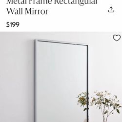 WEST ELM Metal Frame Rectangular Wall Mirror BRAND NEW Polished Chrome   24"w x 1.75"d x 36"h. 35 lbs. Mirrored glass. Metal frame. Hangs vertically o