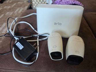 Arlo pro and arlo pro 2 security cameras with bade