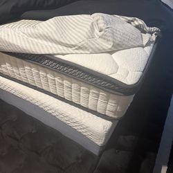 Beautiful truffle queen size bed with extra mattress.