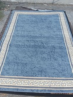 Blue, Cream and Tan Area Rug