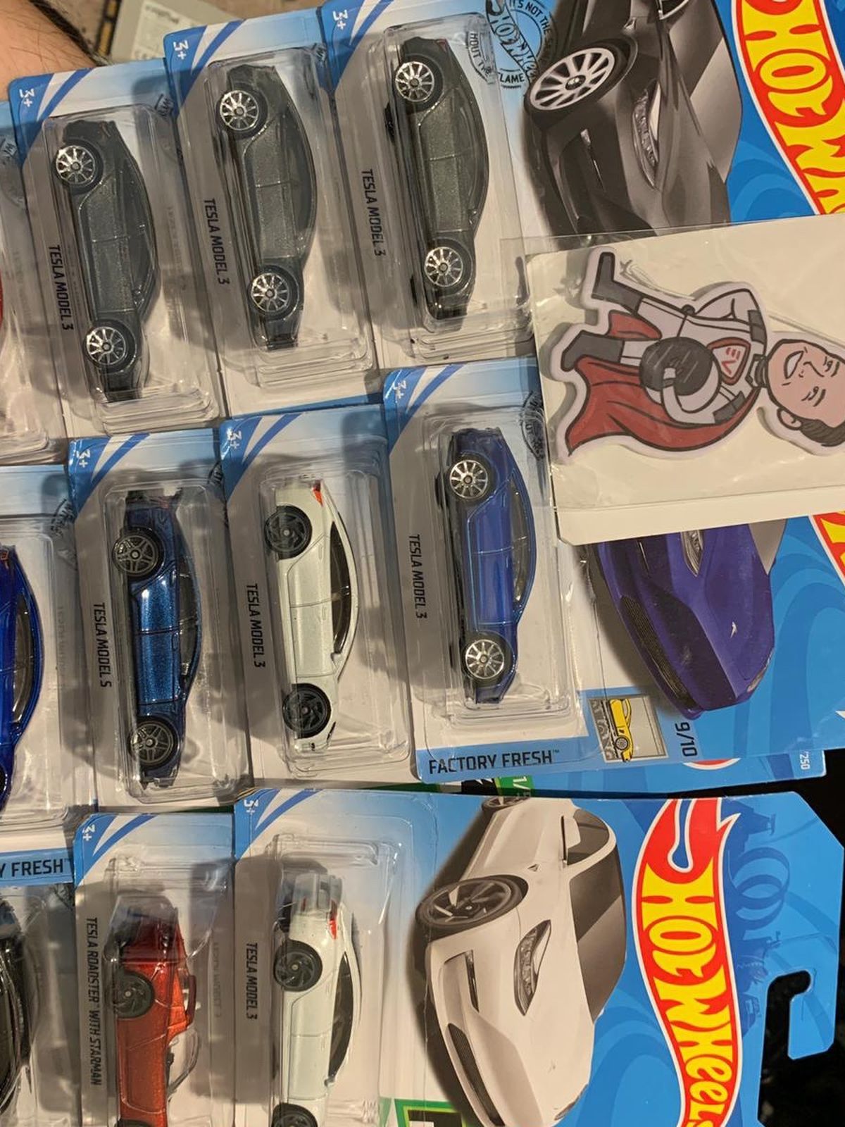 Various Tesla 1:64 models (model 3, Model S, Model X, Roadster) two are modified and won't roll, others in brand new condition