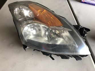 OEM left (passenger side) 2008 Nissan Altima Headlight