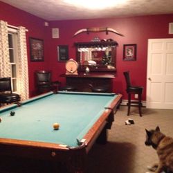 H.J Sullivan Antique pool table good condition. Tons of extras.