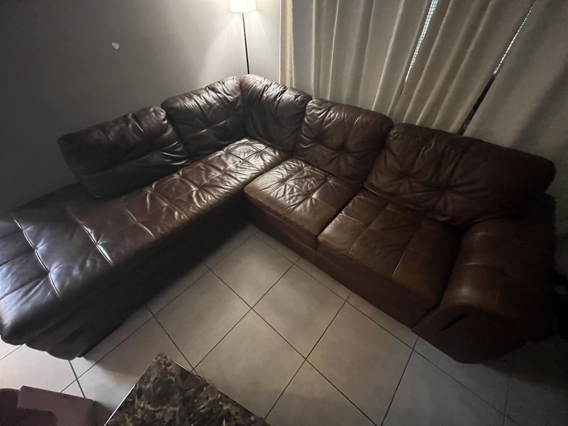 Brown leather Sectional
