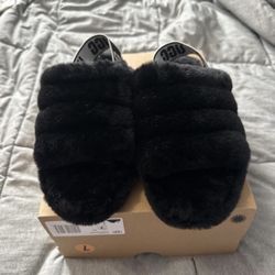 Ugg fuzzy slides with strap.