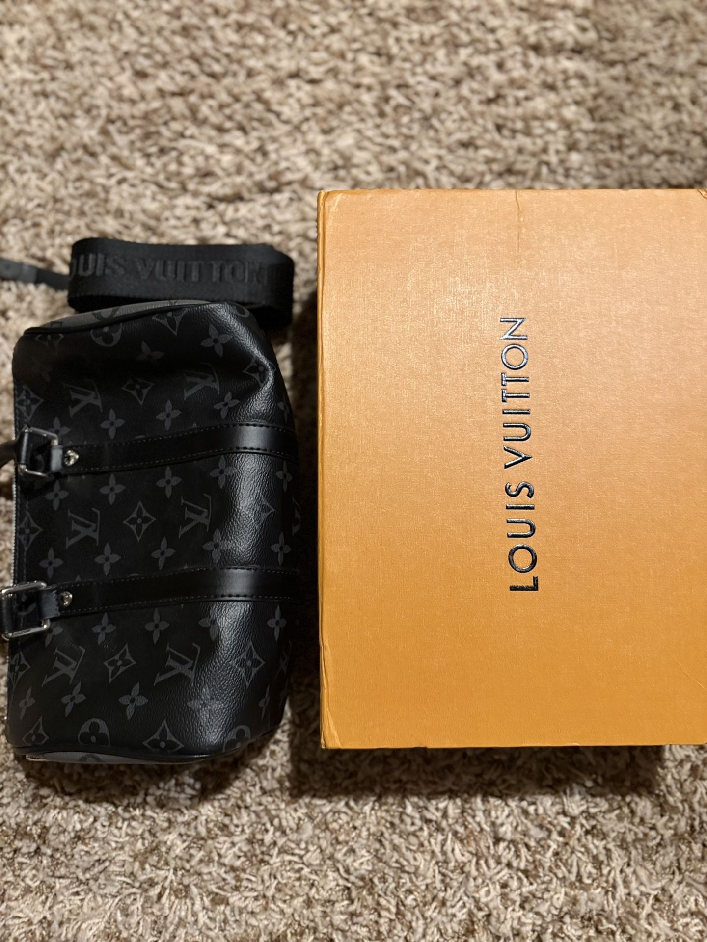 LOUIS VUITTON Keepal Bandouliere 25 Shoulder Handbag