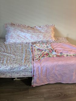 Twin sized mattress, frame, and bedding (Everything included)