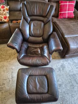 Brown leather recliner with ottoman