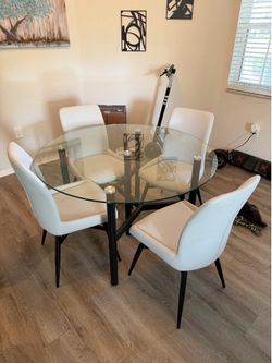 Glass table and 4 chairs