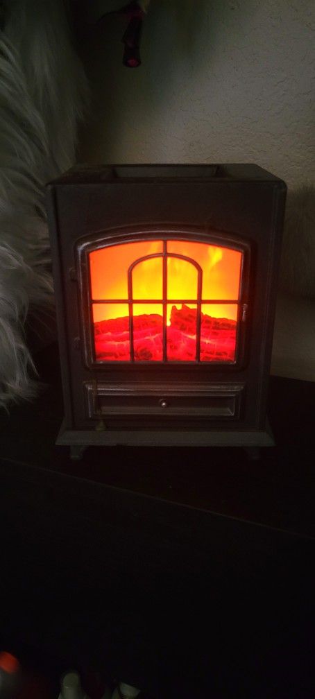 WAX AIRFRESHNER IN THE SHAPE OF A FIREPLACE