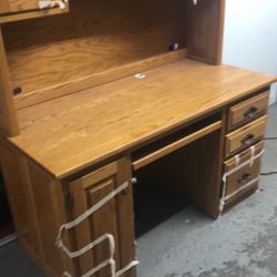 55”wx25”dx30”h Oakwood, strong two pieces desk
