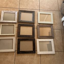 An Assortment Of 8x10 Picture Frames