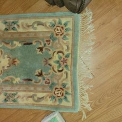 Teal/ Reddish Rug With Flowers