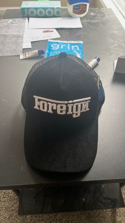 Brand new flair foreign black/white hat in excellent condition price tag still on hat