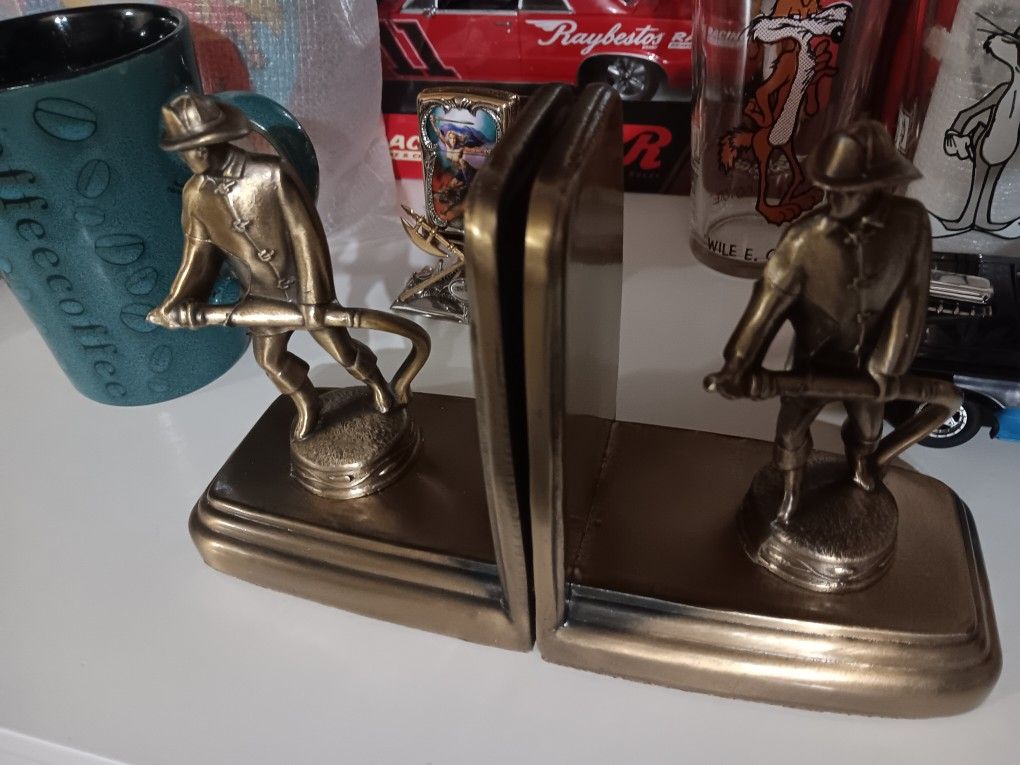 Vintage BRASS FIREMAN BOOKENDS