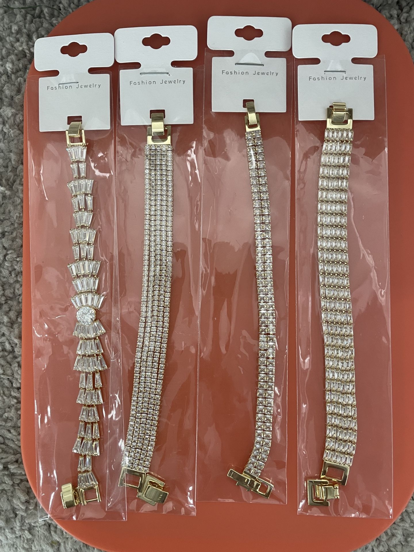 Brand new 14K Gold Plated Women’s Tennis Bracelet ($15 each)