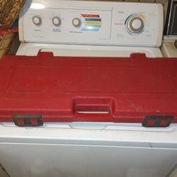 Red plastic power tool carrying case