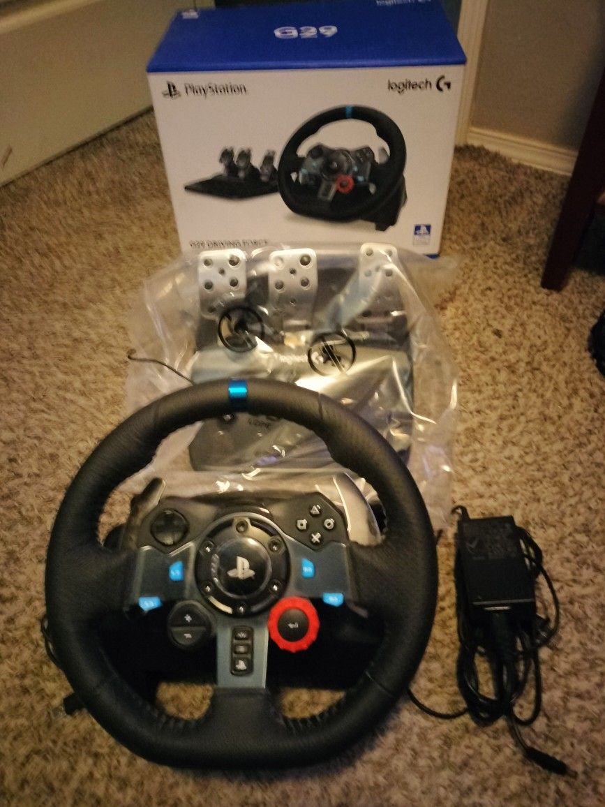 G 29 PlayStation simulation steering wheel pedals are brand new as they are compatible wheel is used normal wear