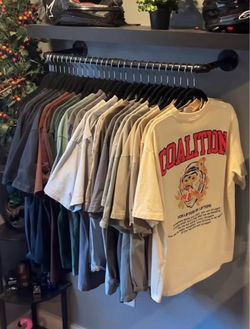 Wall mounted clothing rack